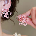 Alloy Pink Hollow Flower Stud Earrings Sweet Spring Light Luxury Floral Jewelry view 4