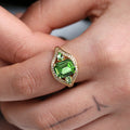 Gold Tone Green Emerald Cut Halo Ring In A Polished Decorative Design view 3