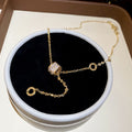 18K Gold Plated Copper Zircon Round Geometric Hourglass Pendant Necklace Light Luxury Clavicle Chain view 2