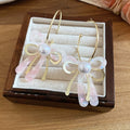 Vacation Style Acetate Bow Faux Pearl Stud Earrings With Silver Pins view 2