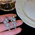 Light Luxury Copper Star Zircon Meteor Clip-on Earrings for Women No Piercing view 3