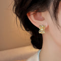 Light Luxury Copper Four Petal Floral Zircon C Hoop Earrings For Women view 4