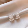 Light Luxury Copper Four Petal Floral Zircon C Hoop Earrings For Women view 3
