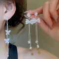 Light Luxury Copper Bowknot Drop Earrings With Sparkling Zircon Tassel Design view 2