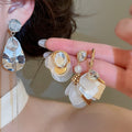 Minimalist Modern White Mother Of Pearl Shell Teardrop Stud Earrings With Sterling Silver Pins view 2