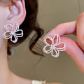 Sweet Macaron Color Hollow Flower Alloy Stud Earrings For Women Spring Summer Style view 3