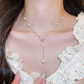 Light Luxury French Gold Rhinestone Leaf Faux Pearl Pendant Sweater Necklace For Women view 1