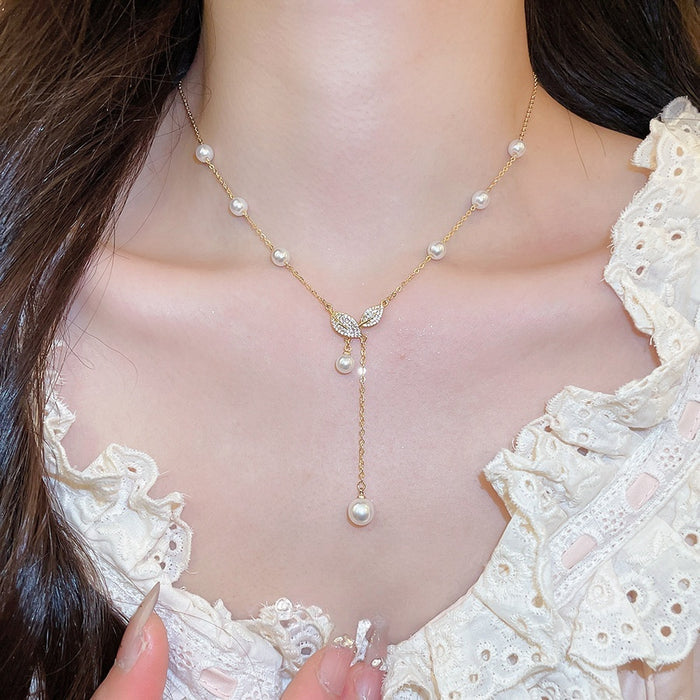 Light Luxury French Gold Rhinestone Leaf Faux Pearl Pendant Sweater Necklace For Women