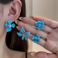 Korean Blue Enamel Flower Studs With Rhinestone Centers Elegant Vacation Style Silver Needle Earrings view 1