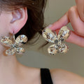 2026 New European American Statement Iron Metal Flower Stud Earrings For Women view 3