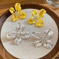 Alloy Zircon Hollow Flower Stud Earrings Irregular Metal Floral Light Luxury Fashion Jewelry view 3