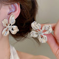 Alloy Zircon Hollow Flower Stud Earrings Irregular Metal Floral Light Luxury Fashion Jewelry view 4