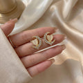 Elegant Gold Alloy Rhinestone Crescent Moon Heart Pearl Stud Earrings For Women Light Luxury Earrings view 2