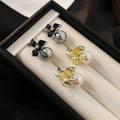 Elegant French Style Alloy Enamel Flower Studs With Rhinestone Center And Faux Pearl Drop Earrings view 2