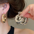 Minimalist Wrinkled C Shape Iron Stud Earrings Geometric Metal Light Luxury Niche Style view 1