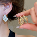 Korean Style Hollow Copper Ear Cuff Earrings With Zircon Accents, Light Luxury Round Design view 2