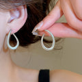 Copper Twisted Oval Stud Earrings Minimalist Modern Geometric Light Luxury Jewelry view 3