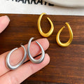 Copper Twisted Oval Stud Earrings Minimalist Modern Geometric Light Luxury Jewelry view 4