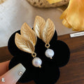 French Vintage Leaf Faux Pearl Stud Earrings For Women Light Luxury Silver Needle Jewelry view 2
