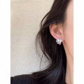 Colorful Alloy Flower Stud Earrings For Women Light Luxury Vacation Style Unique Floral Design view 2