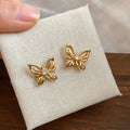Copper Silver Pin 3D Hollow Butterfly Stud Earrings Vintage Light Luxury Modern Commuter Jewelry view 1