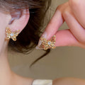 Copper Silver Pin 3D Hollow Butterfly Stud Earrings Vintage Light Luxury Modern Commuter Jewelry view 2