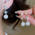 French Light Luxury Full Zircon Flower Faux Pearl Stud Earrings For Women 2026 Elegant Geometric Round Jewelry view 1