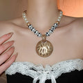 Old Money Vintage Alloy Ceramic Bead Pearl Necklace With Distressed Round Pendant view 1