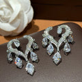Light Luxury Copper Zircon Hollow Heart Tassel Drop Earrings With Silver Needle Princess Style view 1