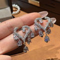 Light Luxury Copper Zircon Hollow Heart Tassel Drop Earrings With Silver Needle Princess Style view 3