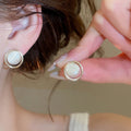 2026 French Light Luxury Round Faux Pearl Cat Eye Stud Earrings For Elegant Women view 4