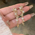 Light Luxury Butterfly Zircon Tassel Faux Pearl Clip-on Earrings For Elegant Geometric Style view 4