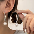 Elegant Silver Needle Large Hoop Faux Pearl Pendant Tassel Simple Fashion Commuter Metal Stud Earrings view 1