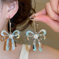Elegant Princess Acetate Bow C-Shaped Pearl Stud Earrings With Silver Pins view 2