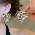 Alloy Twisted Thread Flower Stud Earrings For Women Minimalist Modern Style Jewelry view 4