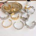 Modern Minimalist Metal Crumpled Leaf Hollow Flower Open Bangle, Light Luxury Statement Jewelry view 2