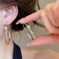 18K Gold Plated Copper Oval Hoop Earrings With Zircon Accents Minimalist Geometric Jewelry view 4