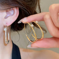 18K Gold Plated Copper Oval Hoop Earrings With Zircon Accents Minimalist Geometric Jewelry view 2