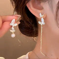 Light Luxury Alloy Butterfly Stud Earrings With Rhinestone Drip Oil And Asymmetric Pearl Design view 1