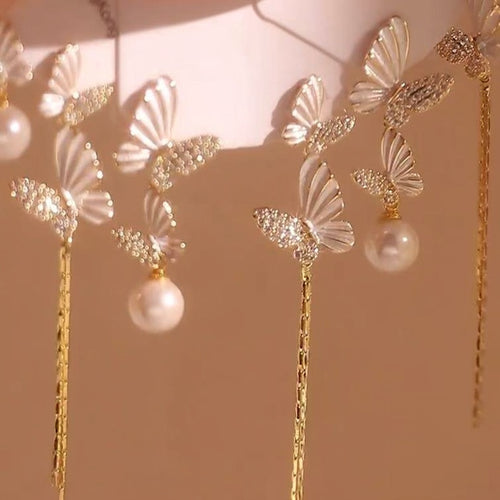 Light Luxury Alloy Butterfly Stud Earrings With Rhinestone Drip Oil And Asymmetric Pearl Design