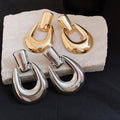 Polished Iron U Shape Hollow Oval Stud Earrings For Women, Minimalist Modern Light Luxury Jewelry view 2