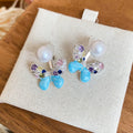 Light Luxury Copper Butterfly Zircon Pearl Stud Earrings For Women Floral Versatile Jewelry view 3