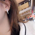 Korean Japanese Small Snake Shape Diamond Inlaid Stud Earrings Minimalist Light Luxury Jewelry view 3