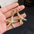 Vacation Style C-Shaped Starfish Shell Conch Stud Earrings With Silver Posts view 1
