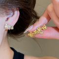 2026 New Sparkling Zircon Bow Stud Earrings Copper French Chic Playful Luxury Jewelry view 2