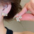 2026 New Sparkling Zircon Bow Stud Earrings Copper French Chic Playful Luxury Jewelry view 4