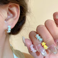 Purple Enamel Flower Alloy Clip Earrings For Women, Sweet Floral Ear Cuff Jewelry view 3