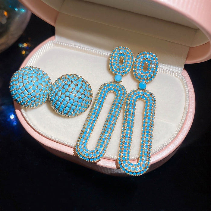Light Luxury Copper Stud Earrings With Blue Zircon Oval Hollow Geometric Design