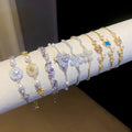 Light Luxury Copper Beaded Bracelet With Sparkling Zircon Flower And Round Geometric Charms view 1