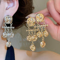 Vintage Luxury Alloy Silver Needle Pleated Metal Long Tassel Geometric Round Drop Earrings view 1